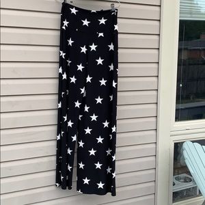 Norma Kamali SiZ L stretchy and wide leg. Stars
